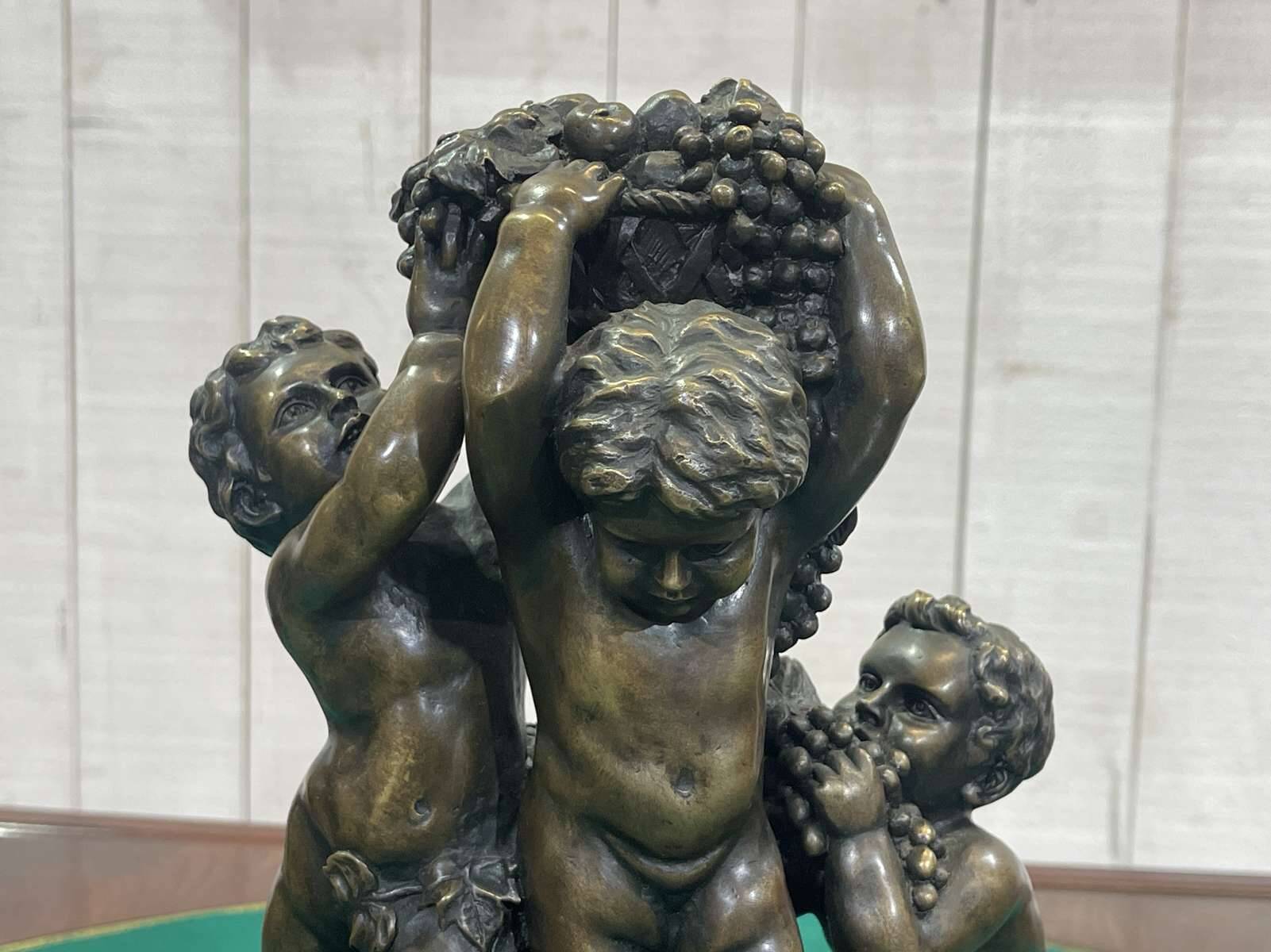 Bronze piece depicting 3 cherubs signed J. DASTE - 1950s