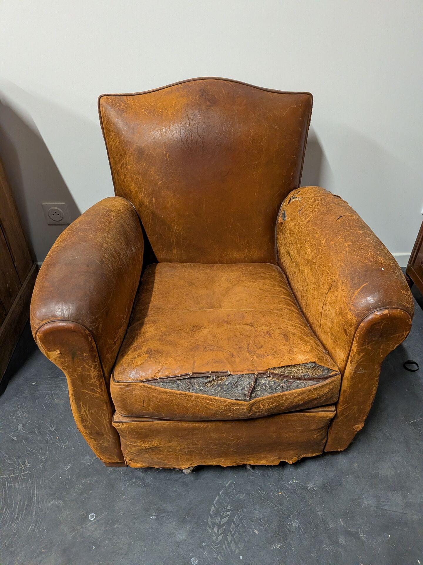 Pair of moustache club armchairs in leather, France, 1930s — to be restored.