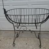 Former cradle in wrought iron