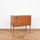 Commode en teck de Hans Hawig Möbler années 1960.
