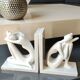 Paire de serre-livres figurines féminines