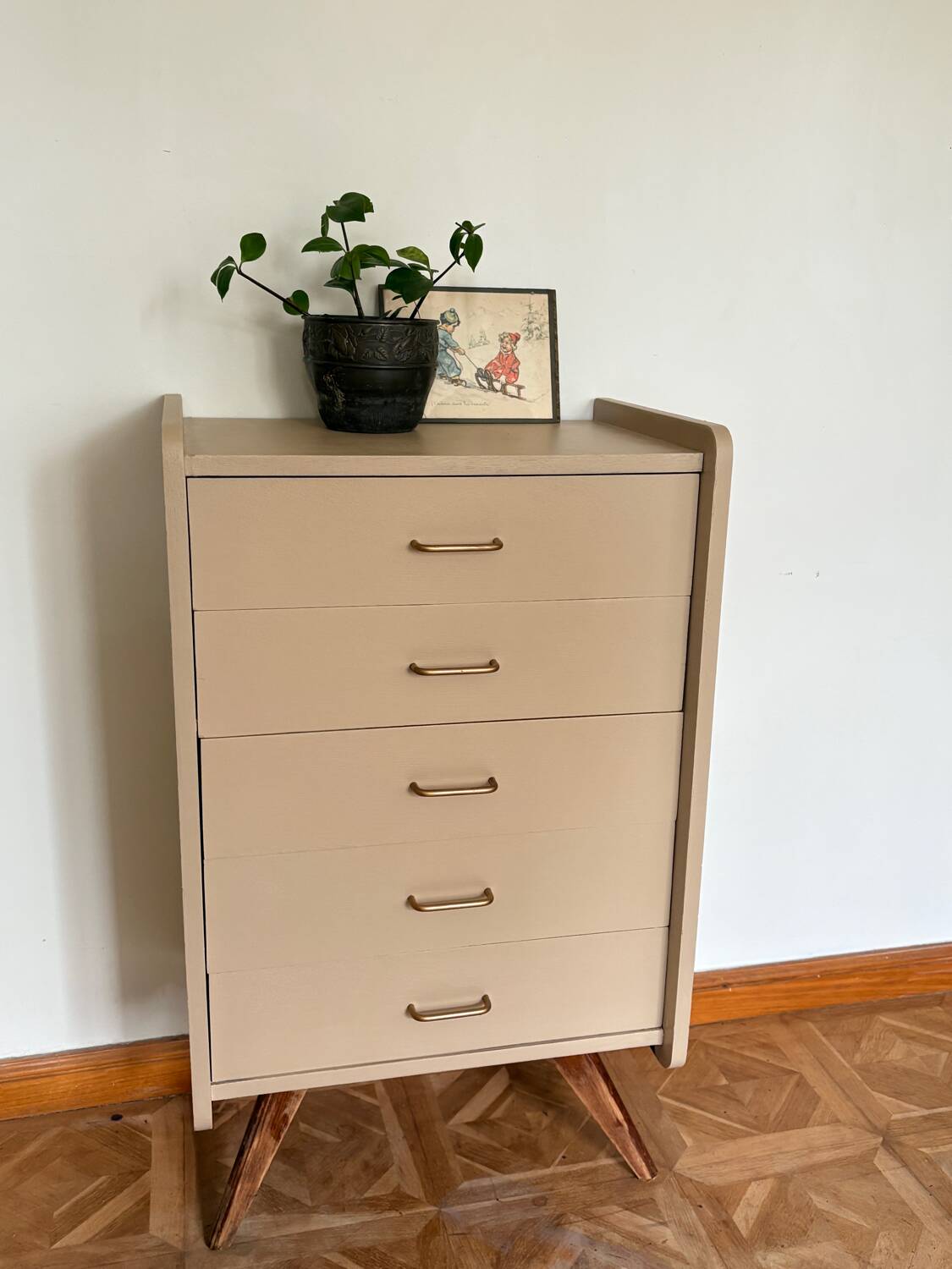 Mocha compass foot chest of drawers