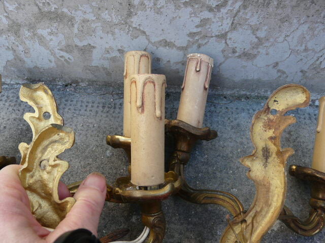 Two pairs of bronze wall lamps