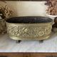 Old repoussé brass planter