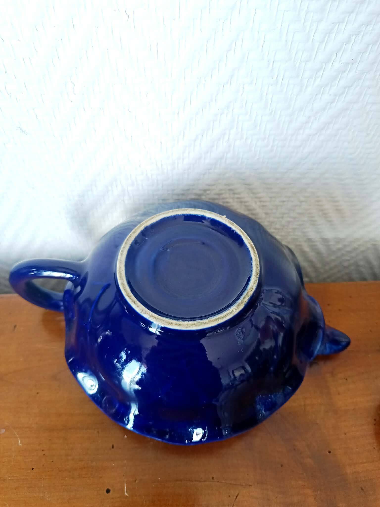 Blue ceramic Art Deco teapot with a frog.