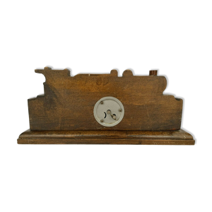 pendule bois sculpté
