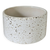 White ceramic vase with a textured effect.