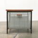 Mid-century teak side table with magazine rack.