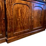 Mahogany bookcase with projection