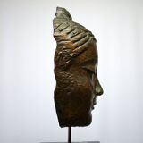 Buddha head sculpture, marble base