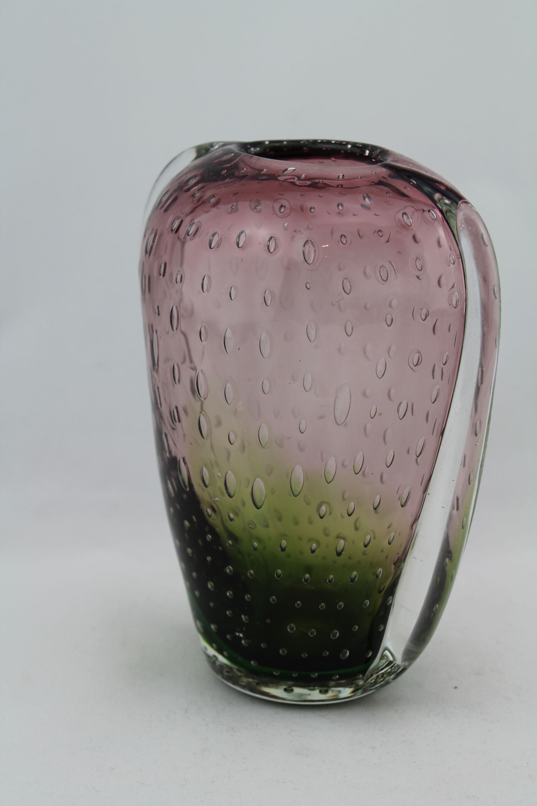 Biot bubble glass vase, doilies