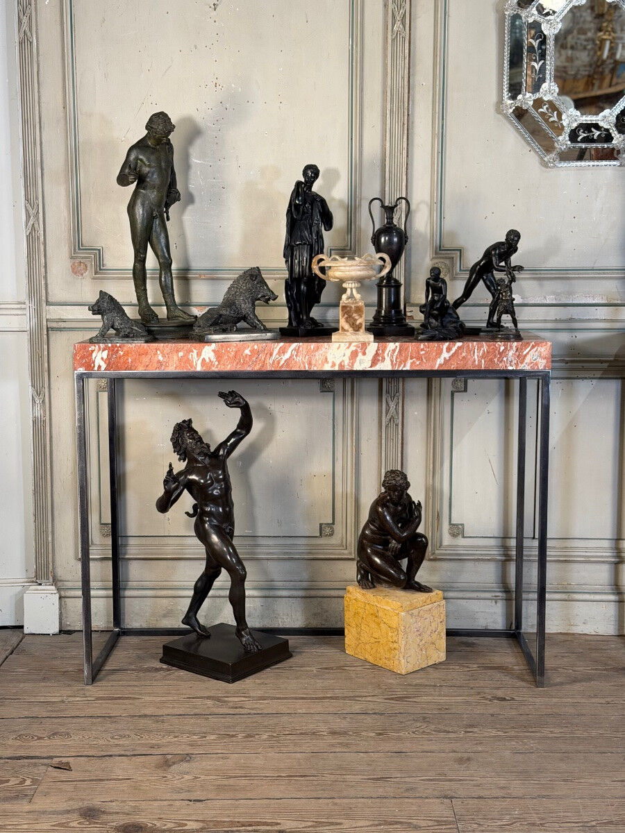 Pair of contemporary consoles in marble and metal.