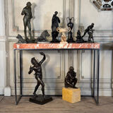 Pair of contemporary consoles in marble and metal.