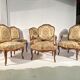 Louis XV style living room including a pair of armchairs and three chairs