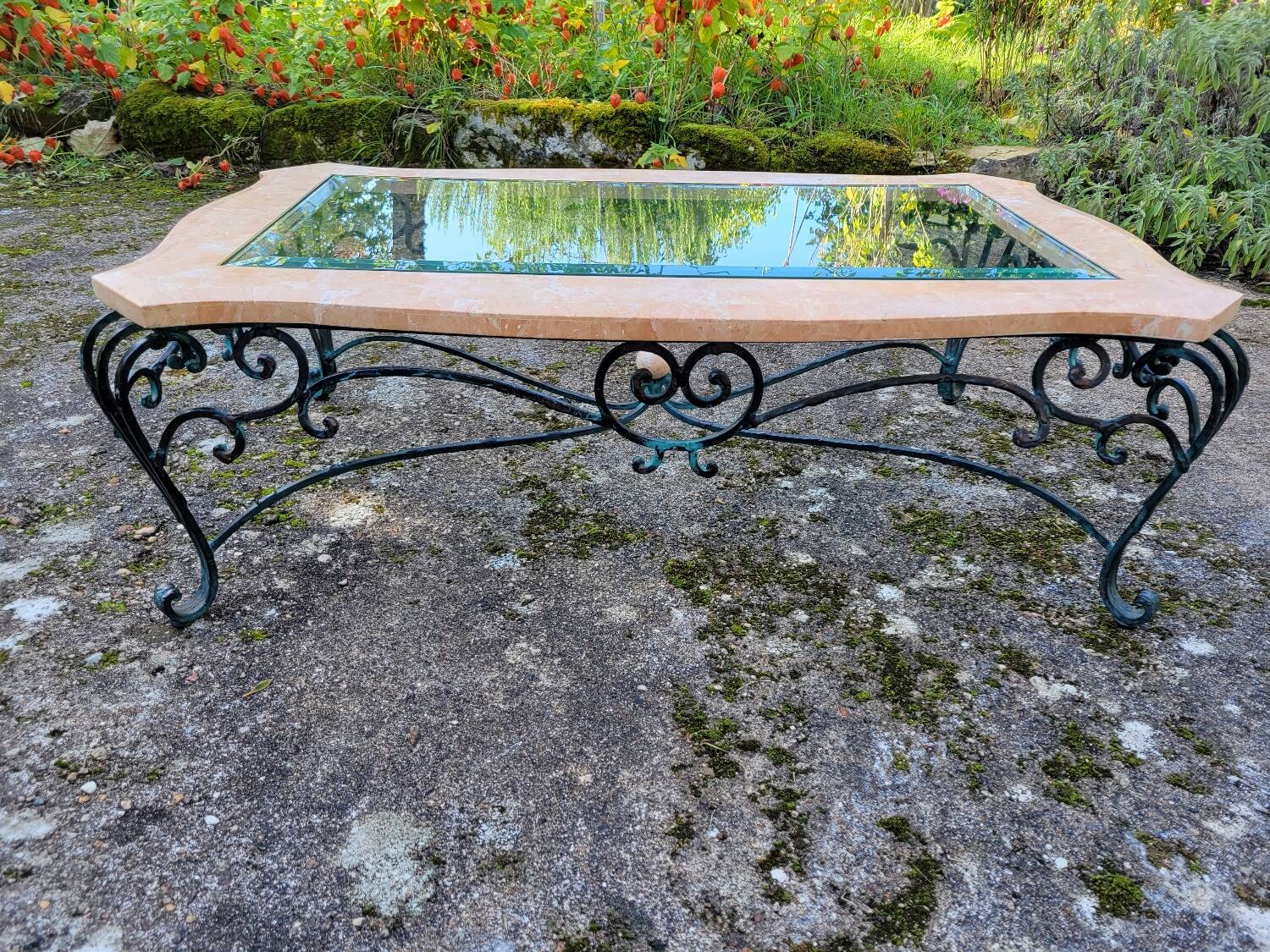 Pink marble and wrought iron coffee table
