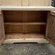 Small vintage yellow bench made of hand-painted wood, low storage from the 1920s.