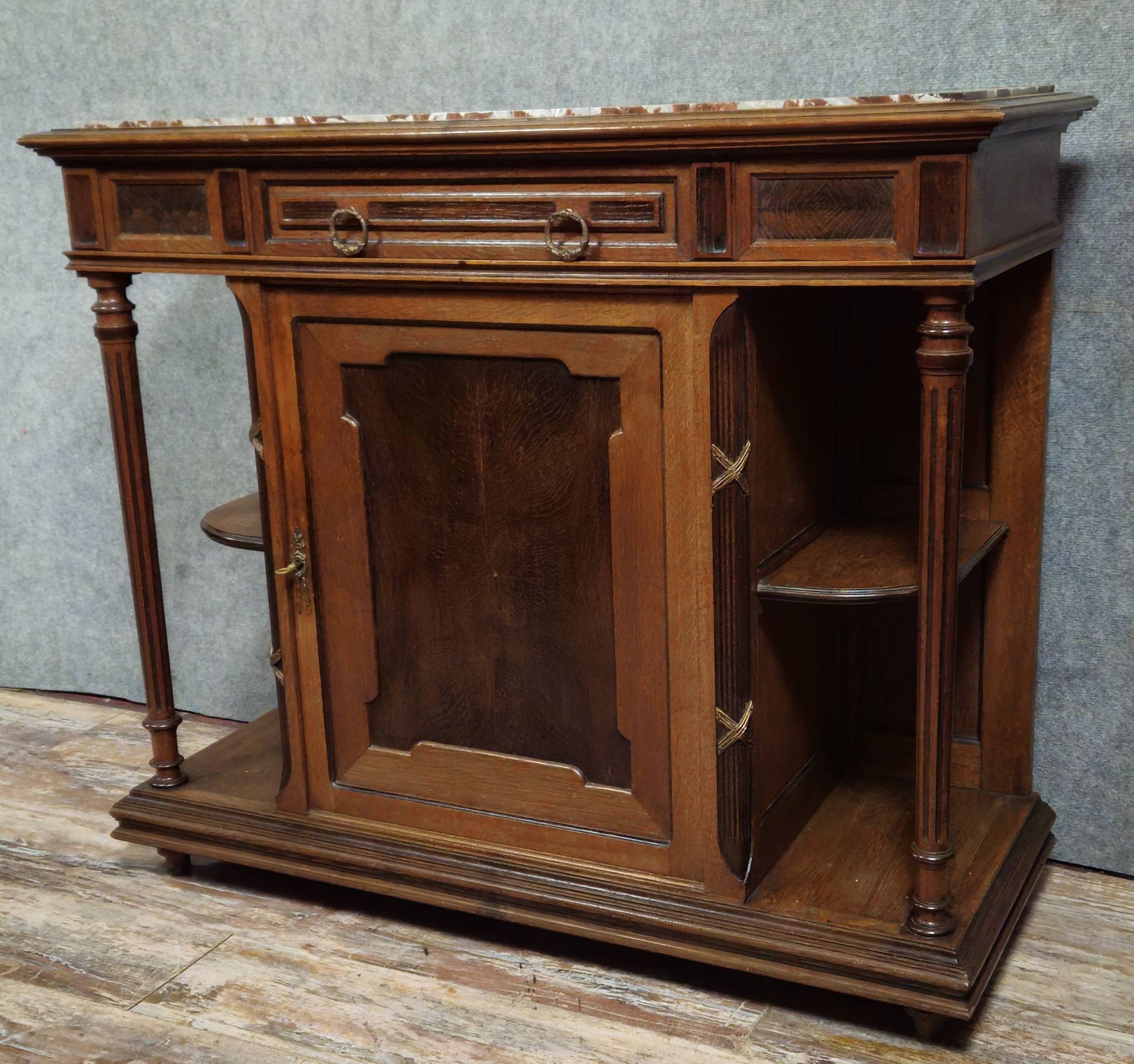 Antique low furniture of the buffet / sideboard / serving table type in Louis XVI style.