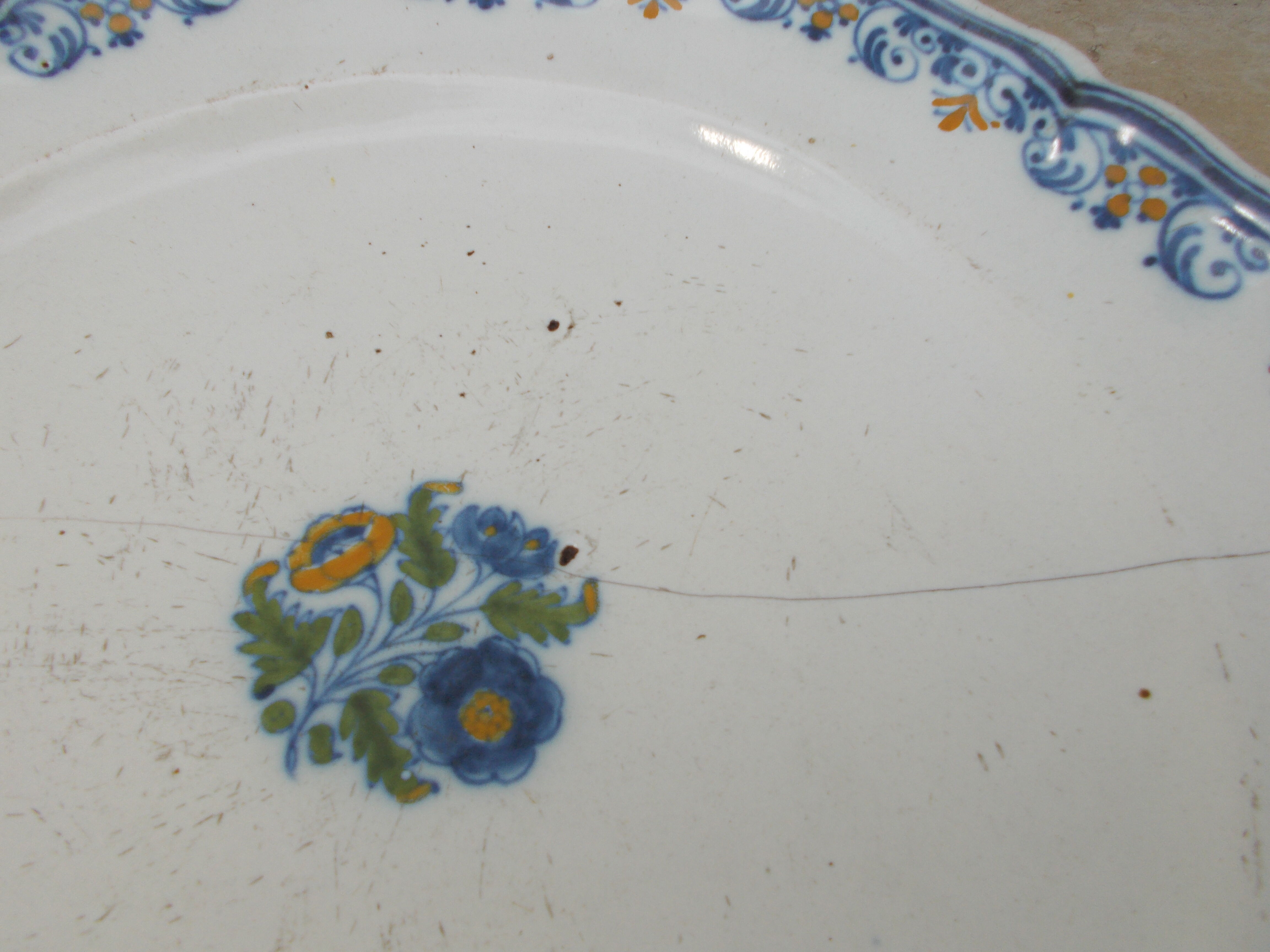 Old faience plate of Moustiers