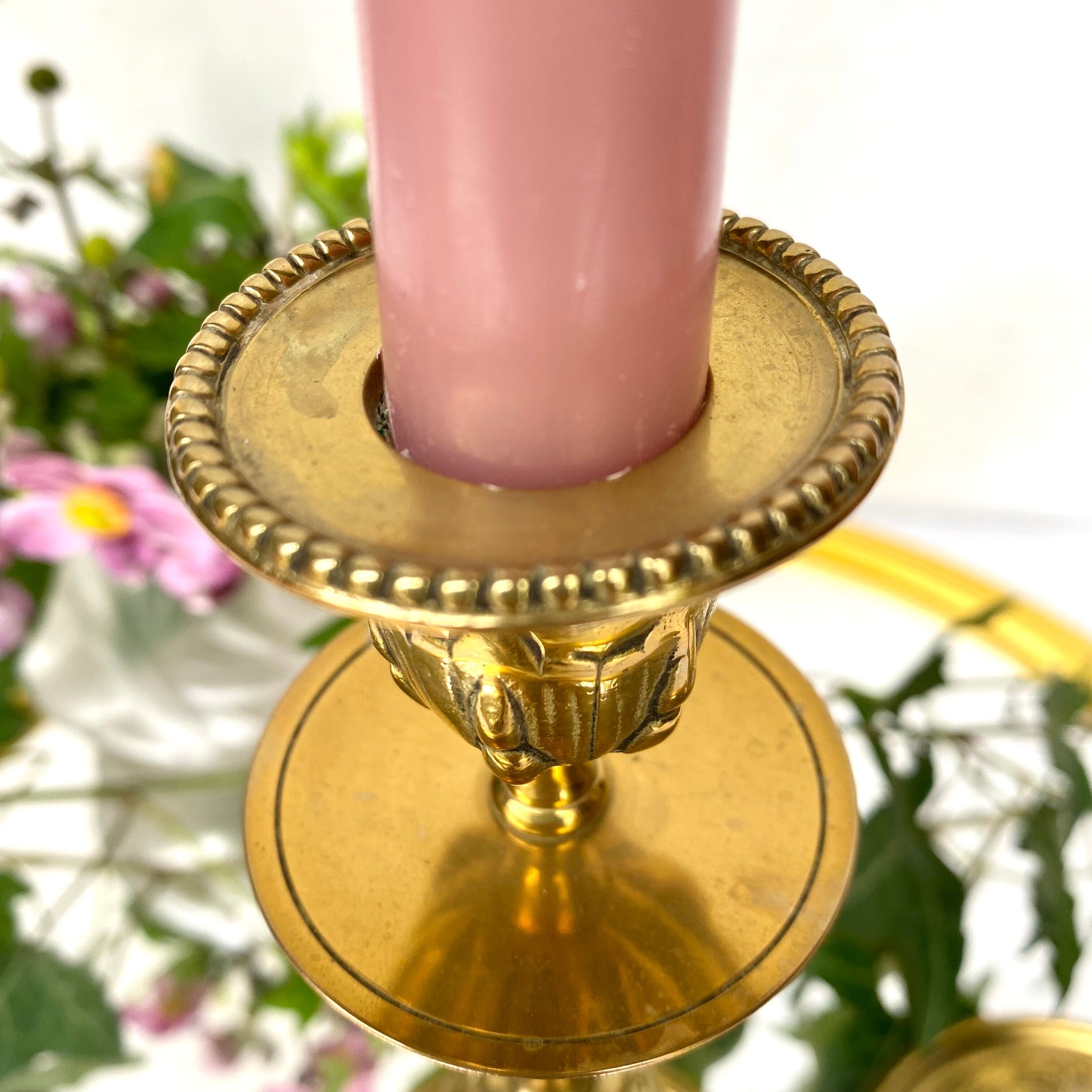 Golden brass candle holders