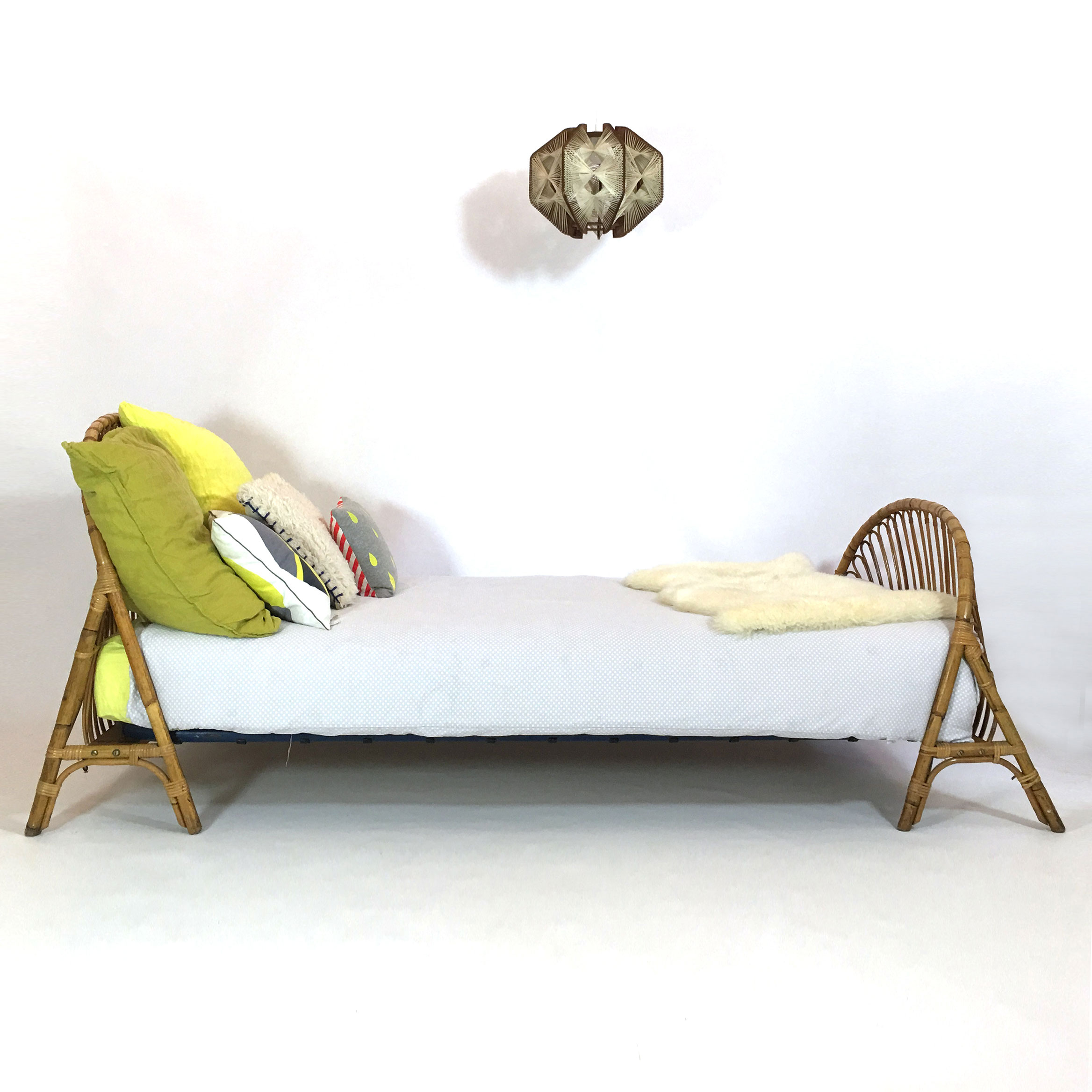 Cot basket rattan of the 1960s