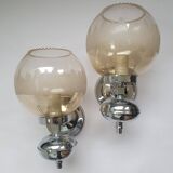 Pair of chrome metal wall lights with vintage sandblasted glass globes