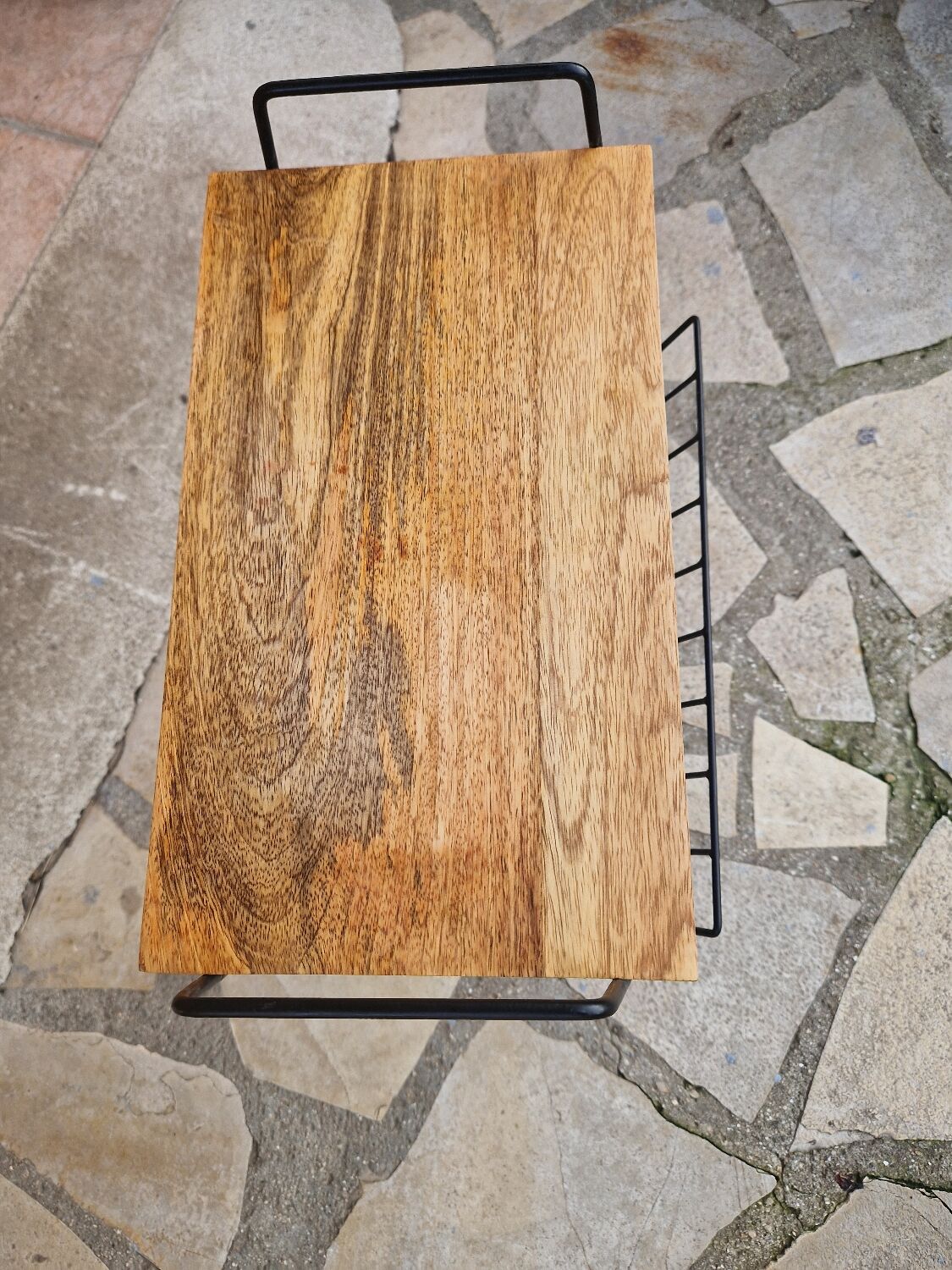 Bedside table with magazine holder