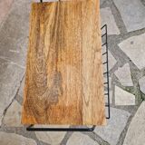 Bedside table with magazine holder