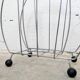 Vintage chrome magazine rack with ball feet