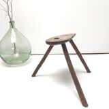 Brutalist tripod stool in solid wood half round