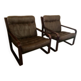 Pair of vintage armchairs in curved wood with suspended seat circa 1970-80.