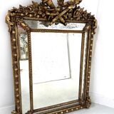 Miroir a parecloses de style Louis XVI en bois et stuc doré XIX siècle