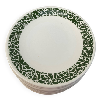 Set of 10 ceramic plates with green foliage decoration.