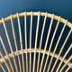Paire de fauteuils corbeille en rotin - vers 1960.
