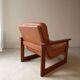 Vintage lounge chair in teak and leather from the 1960s.