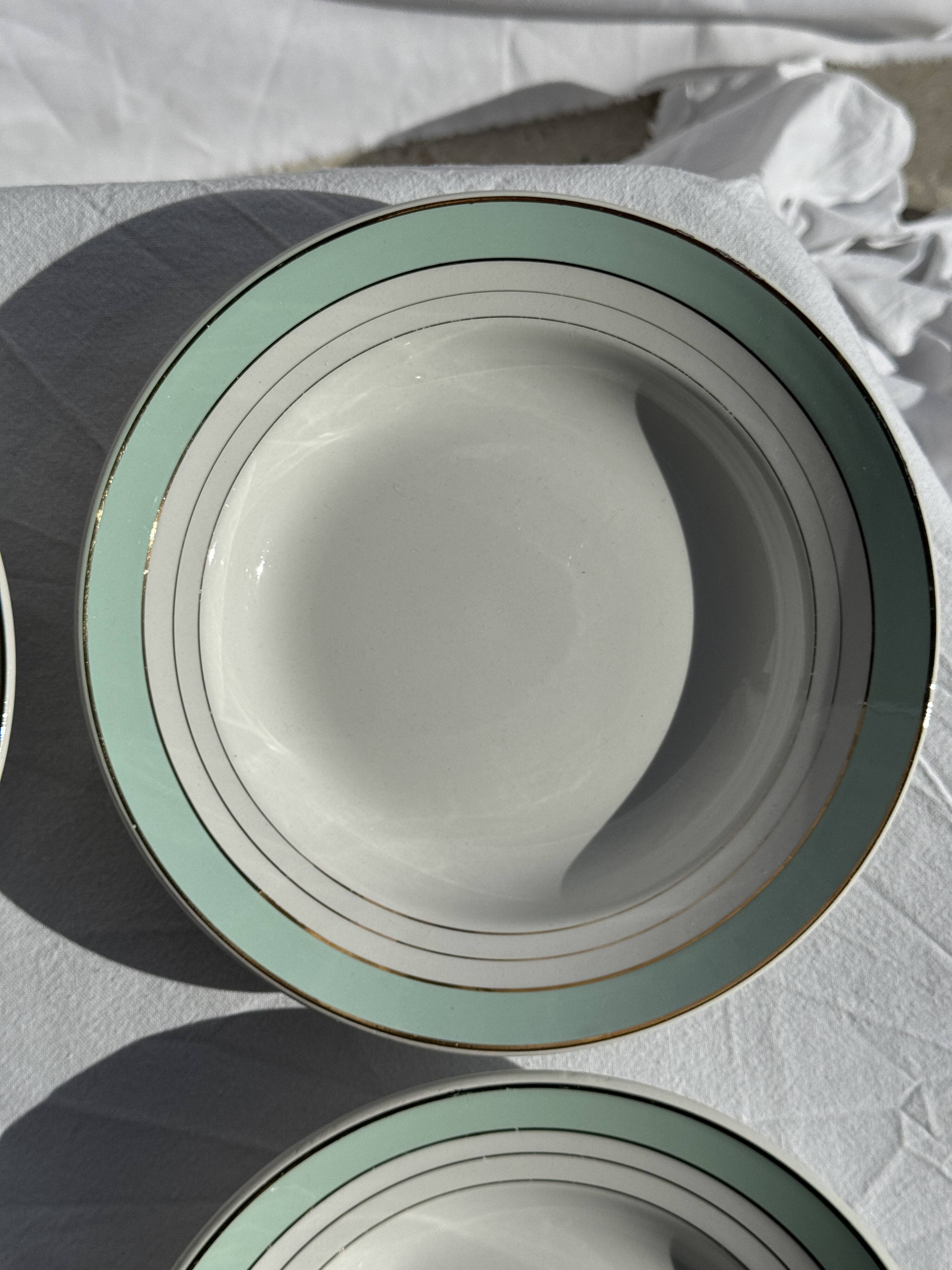Set of 8 antique turquoise deep plates with a gold rim D22.5