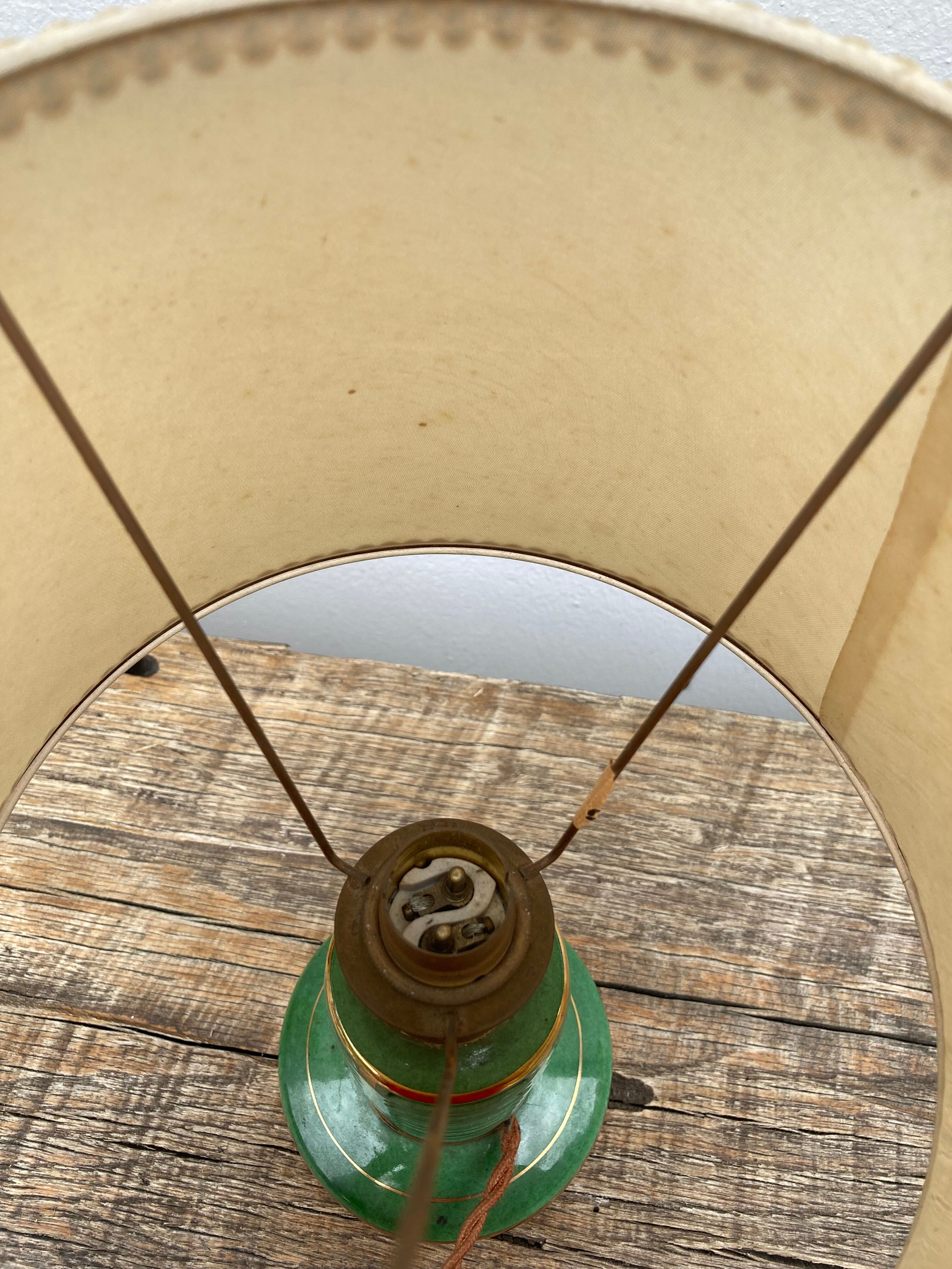 Art Deco table lamp in green ceramic and gold leaf from the 50s