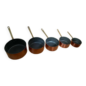 Set of 4 copper saucepans