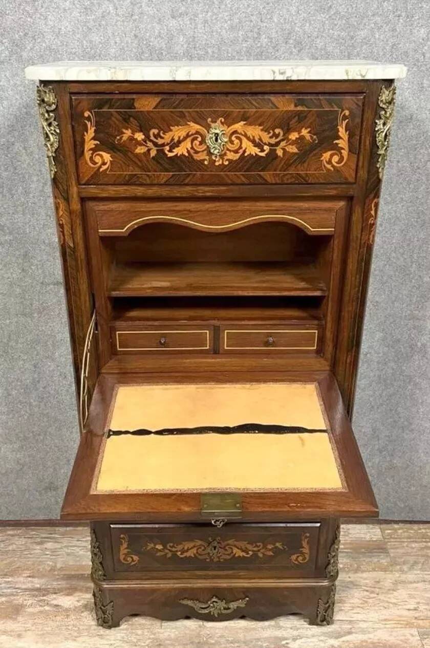 Secretary with a drop-leaf in precious marquetry wood in the Louis XV style.