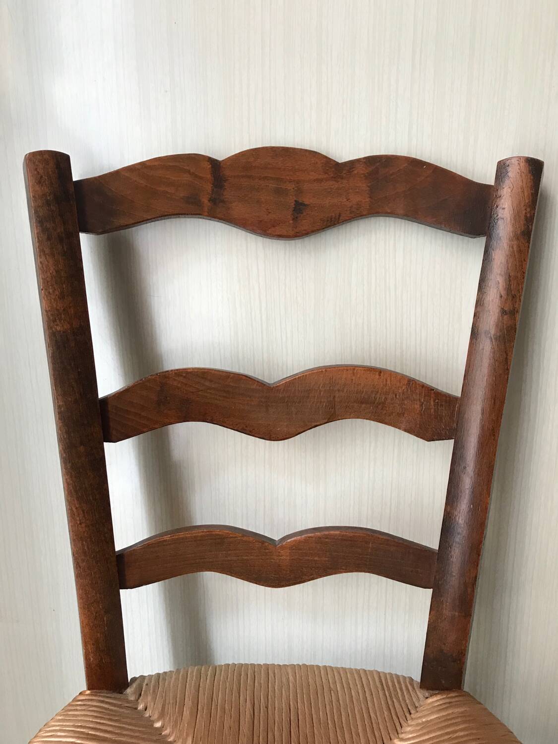 Wooden and straw chairs