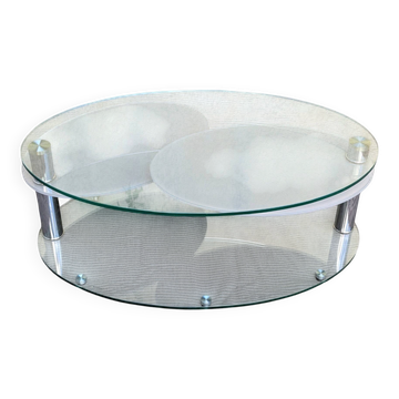 Coffee table with rotating glass tops by Antoine Motard.