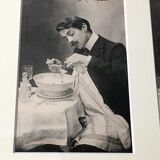Table with 6 old postcards under glass of h. spice-themed manual