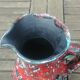 Glazed ceramic pitcher in Fat Lava style