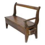 Handcrafted wooden bench with armrest and left drawer.