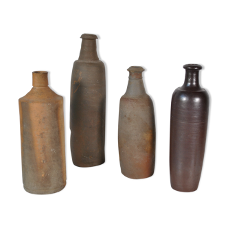 Bottles in sandstone