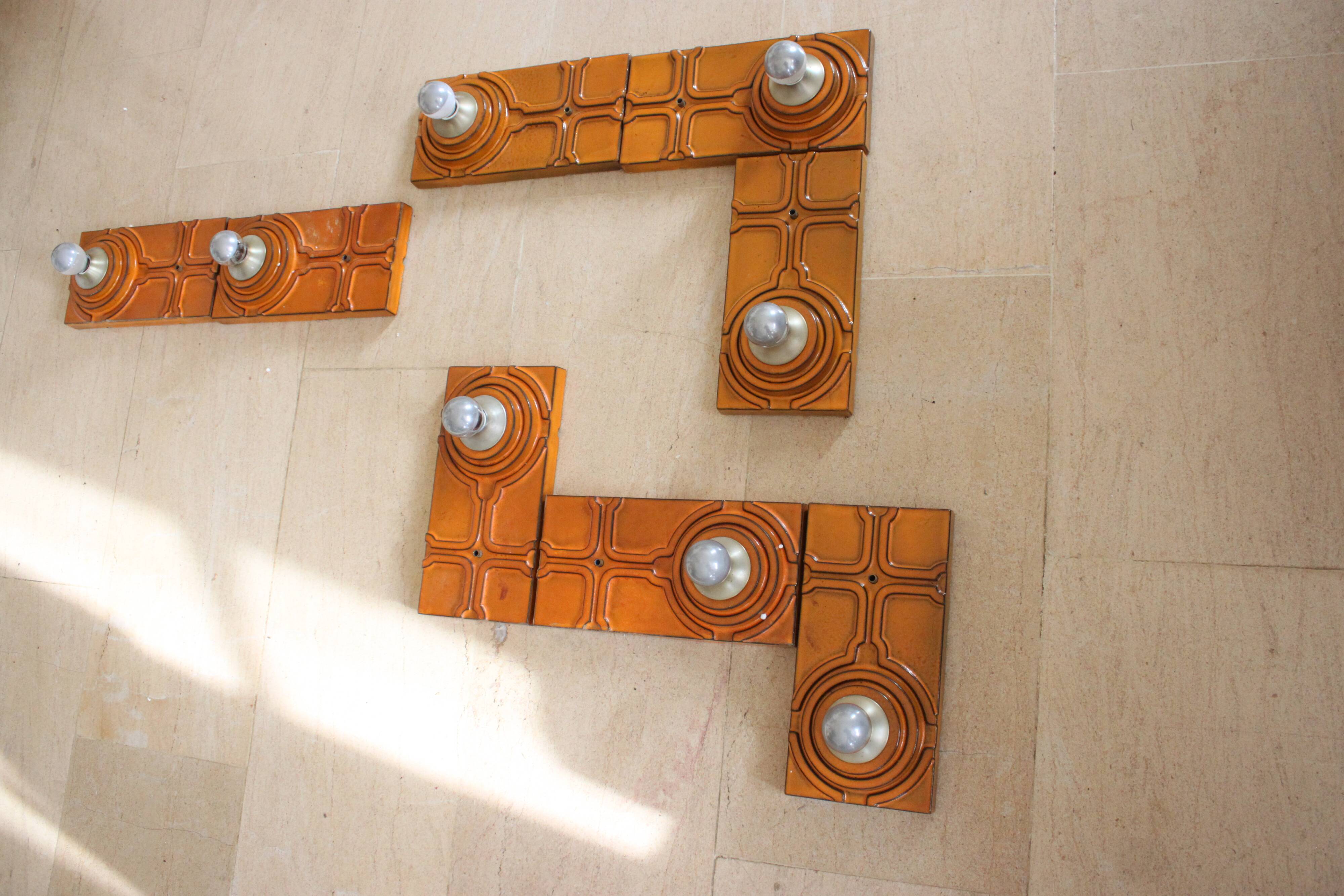 Series of 8 ceramic wall lamps 70s