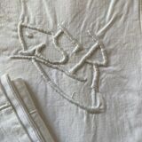 Pair of hand-embroidered SR monogram pillowcases.