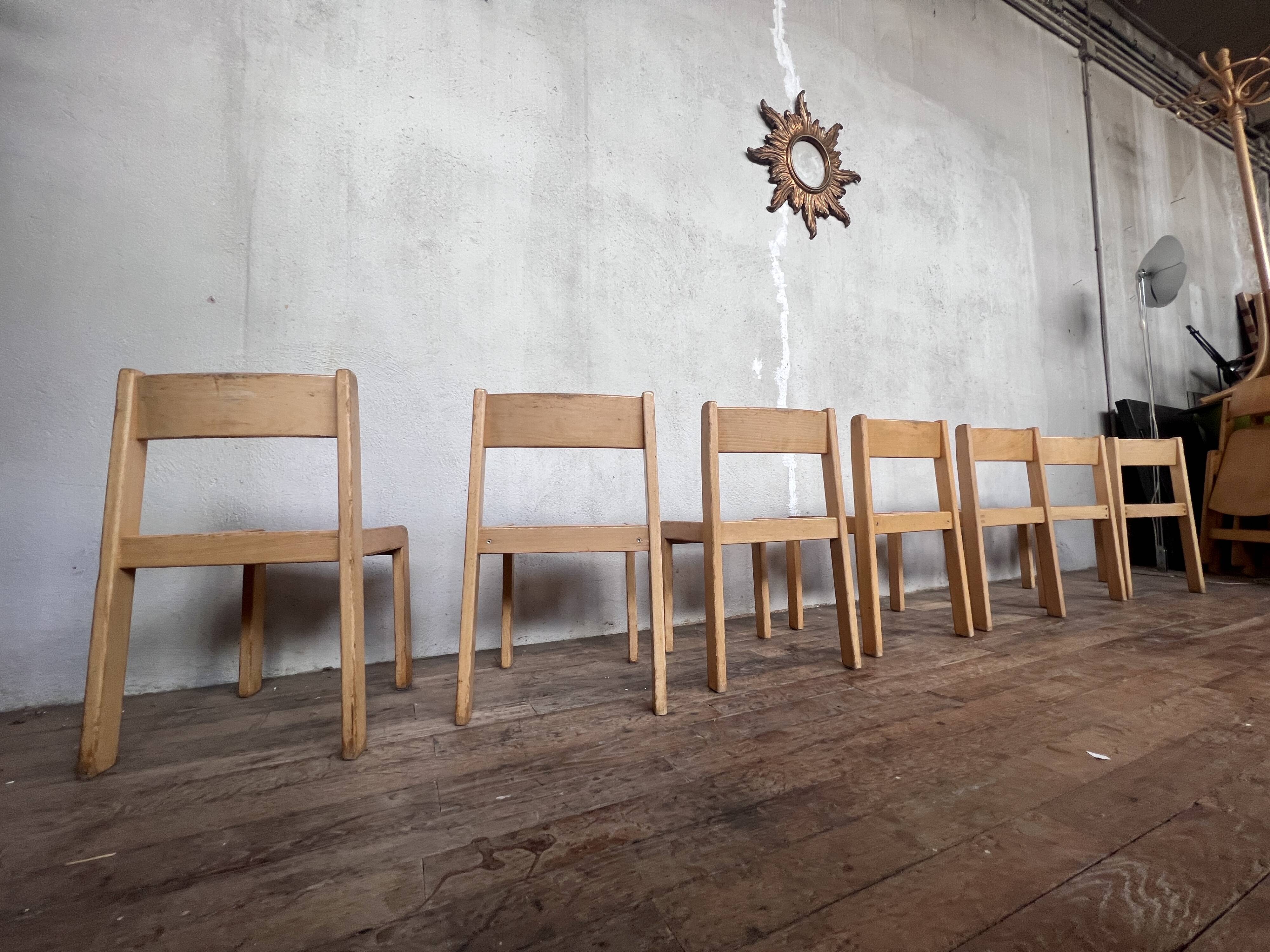 Series of 7 vintage Scandinavian bohemian wooden children's chairs