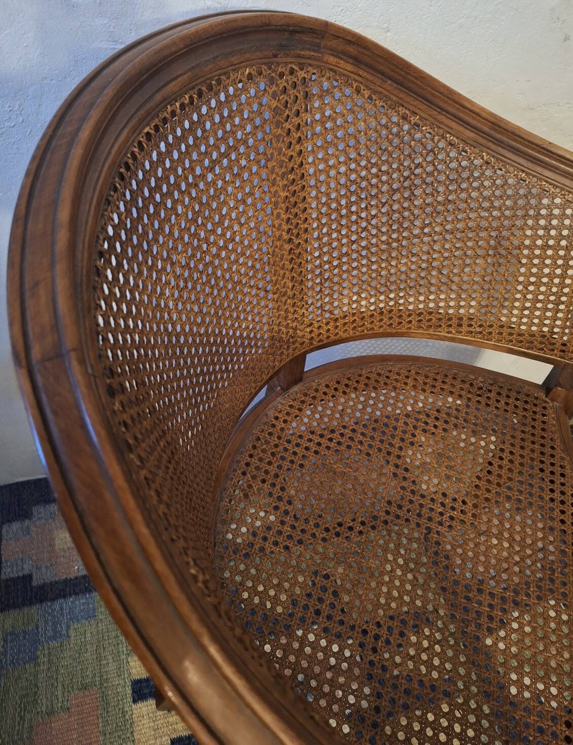 Half-moon rattan and hardwood armchair, early 20th century