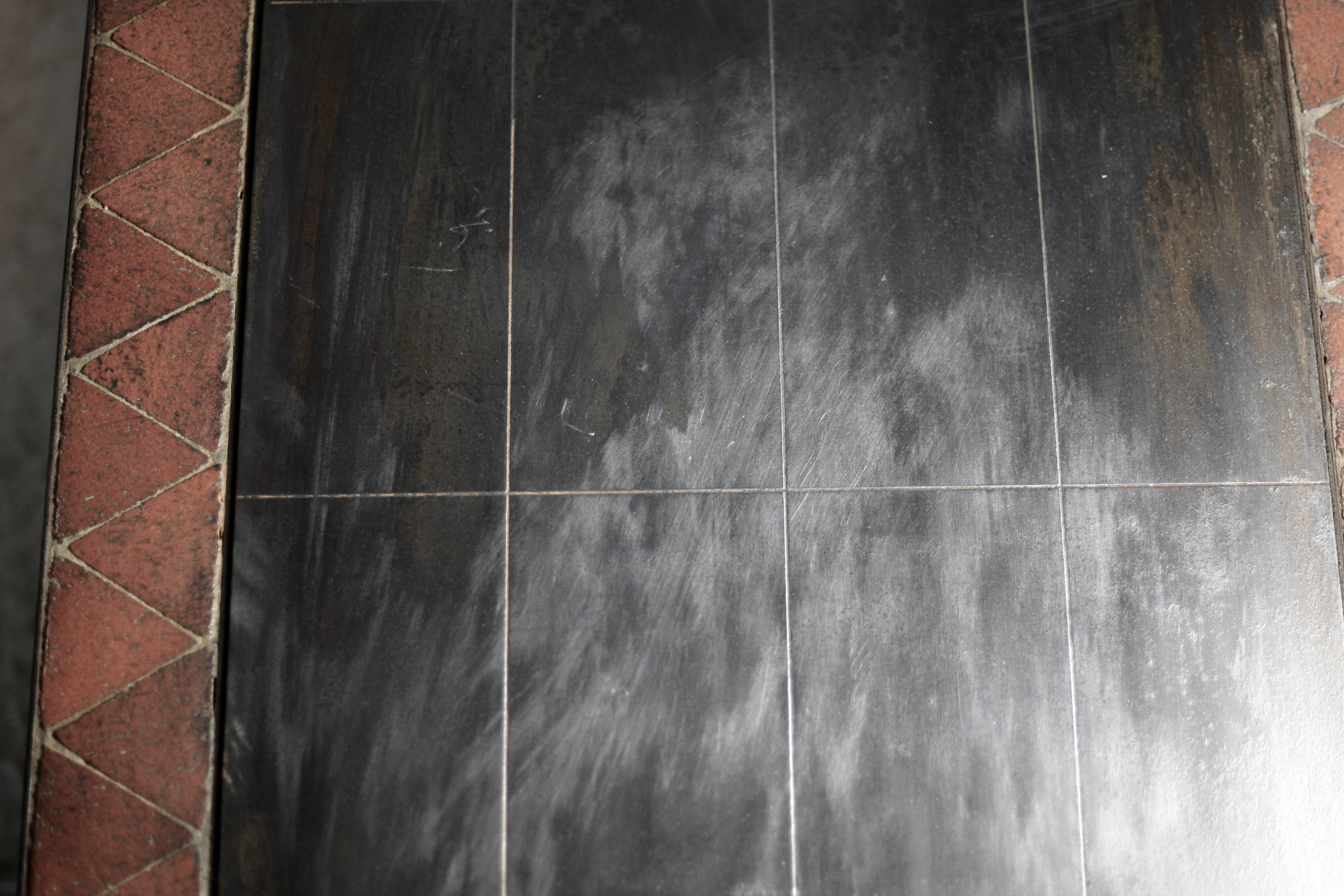 Coffee table, ceramic and steel plates, circa 1960.