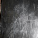 Coffee table, ceramic and steel plates, circa 1960.